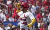 A's overpower Cardinals 11