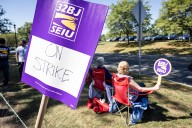 Workers striking at Mount Holyoke invoke alum, former Labor Secretary Francis Perkins, on picket line