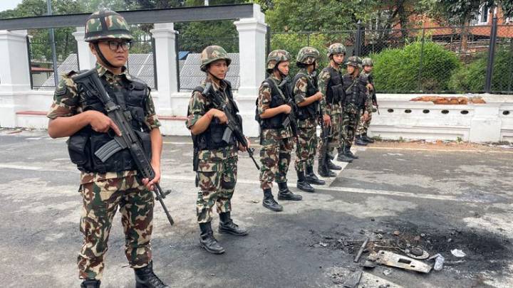 Military curfew brings an uneasy calm to Nepal's capital after violent protests