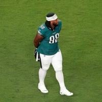 Eagles' Carter tossed from NFL opener for spitting on Cowboys' Prescott