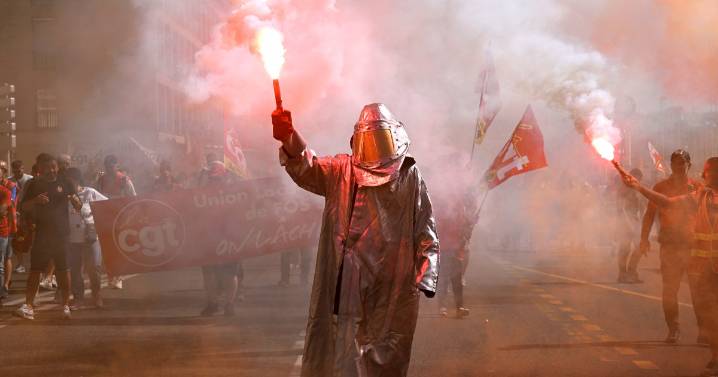 Strikes and protests roil France, pitting the streets against Macron and his new prime minister