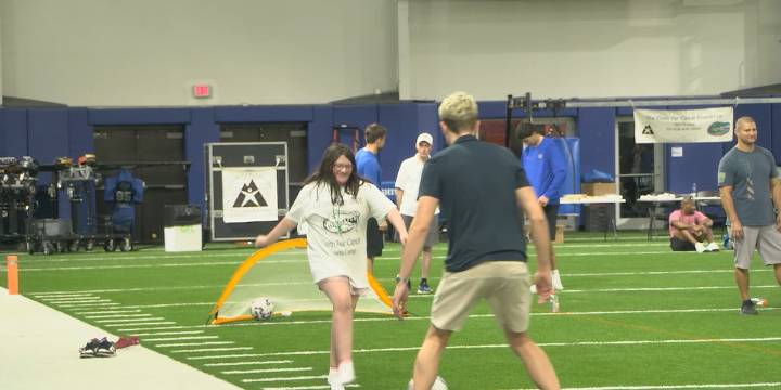 Gator athletes make an impact at Climb for Cancer sports camp