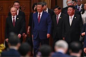 China’s Xi at centre of world stage after days of high