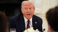 Trump having dinner at a restaurant near the White House to promote his Washington crackdown