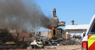 Punctured refrigerant compartment sets metal scrap pile on fire in Bullhead City