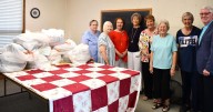 Donation tacks together Dorcas Quilters, Poshard Foundation