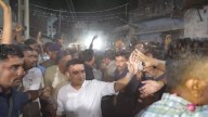 As police try to bring calm, Gujarat Minister performs aarti at garba event in Gandhinagar village hit by violence