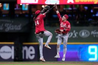 Reds inch toward a playoff berth, one game at a time