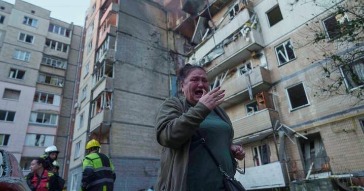Ukraine government building damaged in Kyiv in the largest Russian attack since the war began