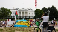 A decades-long peace vigil outside the White House is dismantled after Trump's order