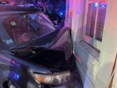 Driver injured after medical emergency causes car crash into house in Acton