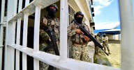 14 killed, including a guard, in prison clashes in Ecuador as some inmates escape