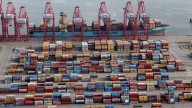 Shipping containers tumble off cargo ship into water at Port of Long Beach