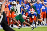 Gramatica's kick lifts South Florida to an 18-16 upset at No. 13 Florida and heats Napier's seat