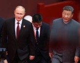 In hot mic moment, Xi and Putin muse about living forever