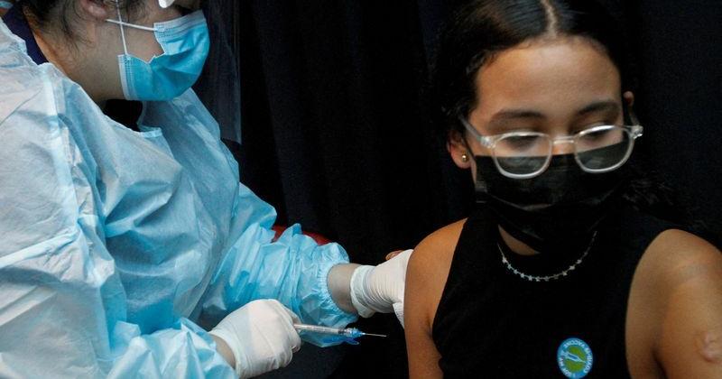 Factbox-Vaccine requirements and exemptions across US