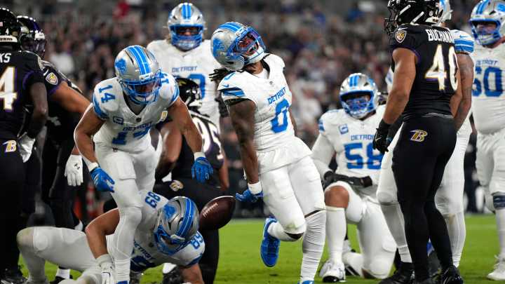 Lions rise to the occasion, down Ravens in heavyweight fight