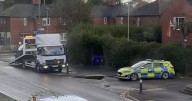 Police close road after man 'struck by car' in south Manchester