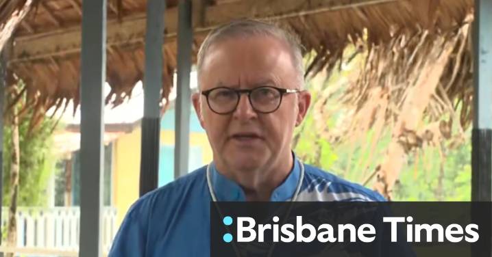 Albanese quickly changes shirt after fashion faux pas at crucial summit