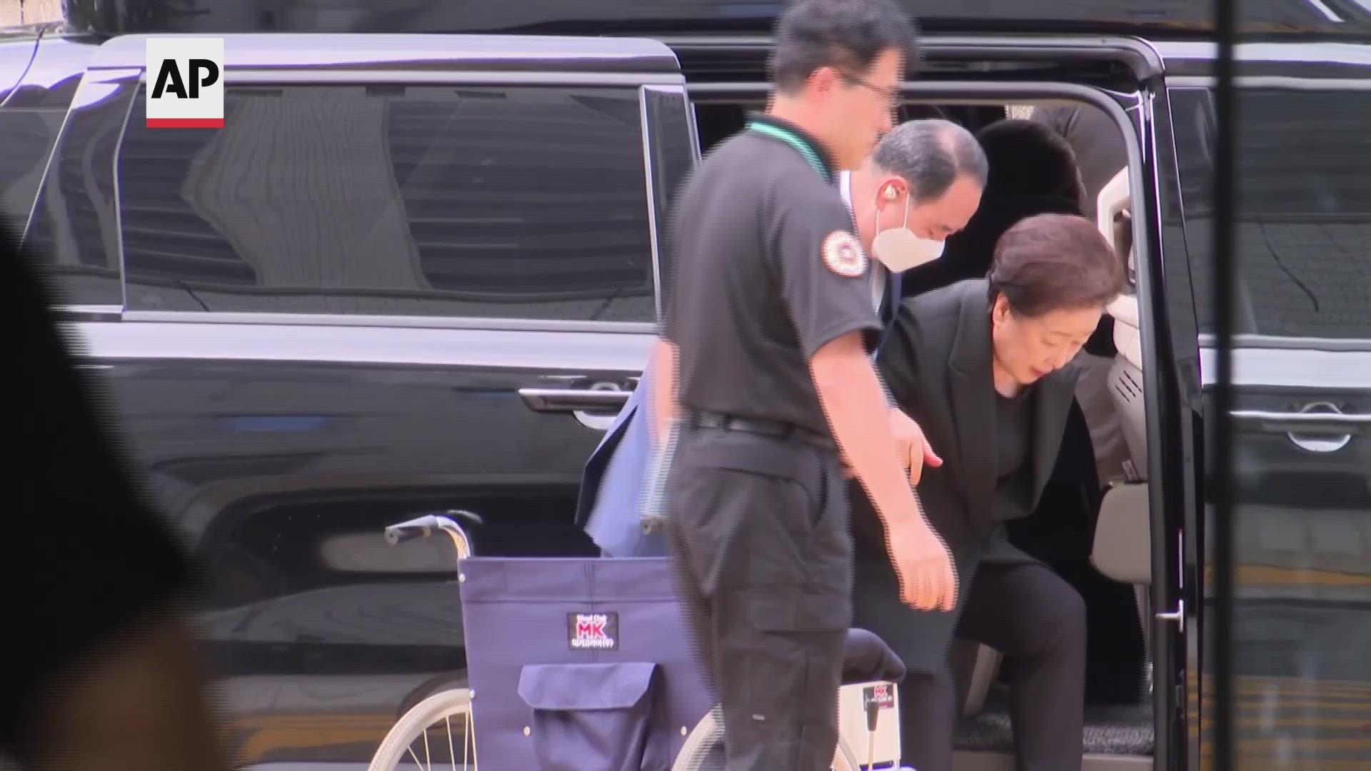 Unification Church leader arrives at Seoul court for arrest warrant hearing