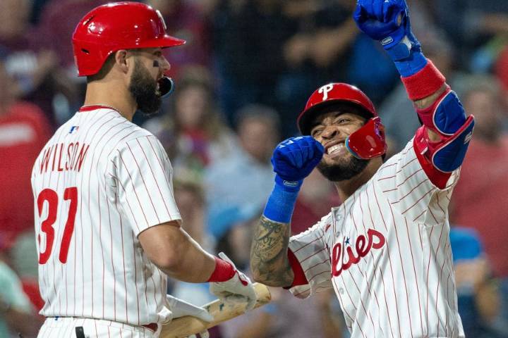 Phillies wrap up a 1st-round bye, hitting a team-record 8 homers to rout the Marlins