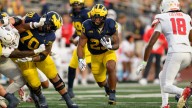 Michigan plans to run with 'hot' back despite early edge going to Justice Haynes