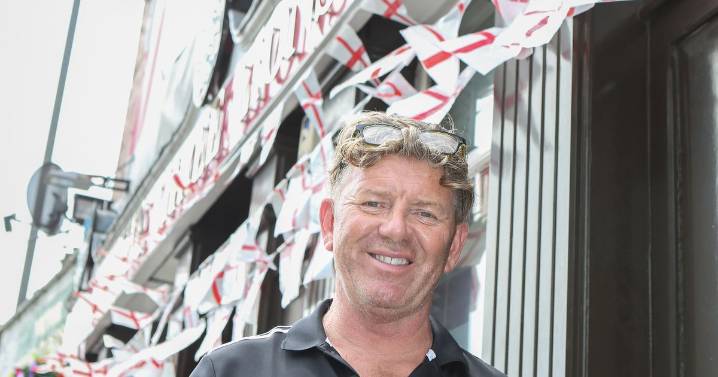'I don't want a divided community' says pub landlord after England flags pulled down