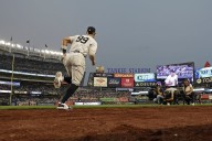 Judge throws gingerly in first outfield appearance since July, but insists arm is 100 per cent