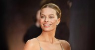 Margot Robbie's curves on display as every inch exposed in nude illusion gown