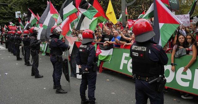 Spanish Vuelta stage cut short because of disruption by pro-Palestinian protesters near finish line