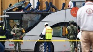 Train hits bus near Mexico City, killing 10, injuring 41