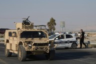 Gunman kills 2 at Israeli-run crossing between West Bank and Jordan. 4 soldiers killed in Gaza