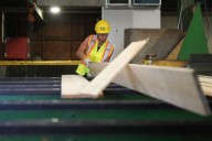 Canadian softwood producers hit with new 10% tariff on lumber shipments into U.S.