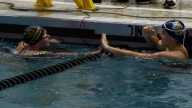 Neuqua Valley outscores home team Metea Valley in girls swimming