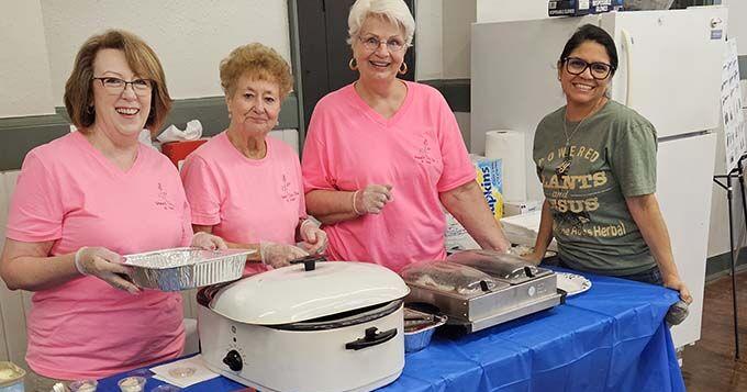 The ladies of VFW Post 6380 serve pancakes