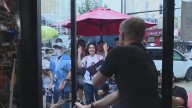 Bears fans eating for free at Wiener Circle after big win