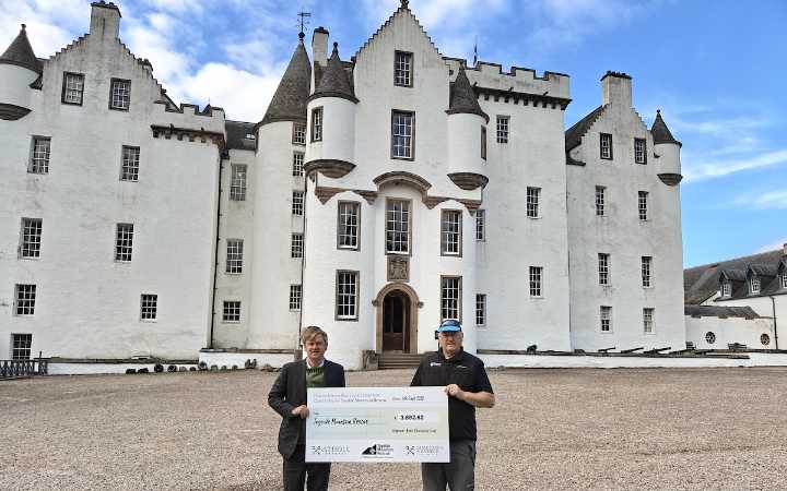 Atholl Estates presents cheque to mountain rescue team
