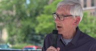 Evers signs executive order ensuring access to vaccines