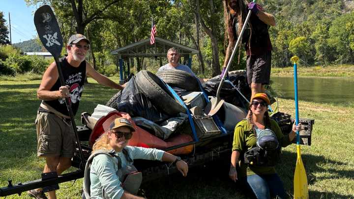 A year after Helene, raft guides clean up a Tennessee river : NPR