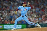 Luzardo retires 22 straight as Phillies sweep Mets, eye NL East title