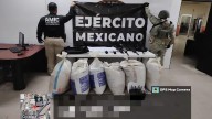 Incautan costales de marihuana y arsenal de armas