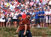 Watch: From ‘F*** you, Rory’ and ‘Teletubby’ chants to fighting in the stands – how day two at the Ryder Cup turned into a circus of abuse for McIlroy and Lowry
