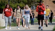 Can you legally carry guns on college campuses in Illinois?
