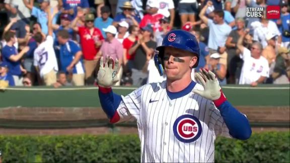 Busch stars as the Cubs beat the Cardinals 7-3 to clinch the top NL wild card
