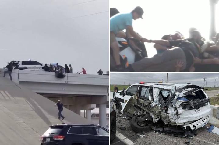 Wild video shows sheriff's deputy dangling from bridge after truck totals his squad car