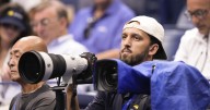 Basketball player Landry Shamet takes his shots as a photographer working at the US Open
