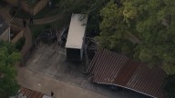 Deputy shoots at suspect after truck crashes into patrol car, HCSO says
