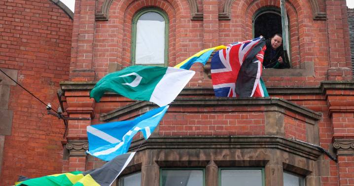 'Britain comes in all kinds of colours' - international flags hung above Nottingham street