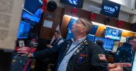 Stocks wobble as Wall Street wrangles with whether the job market is too weak
