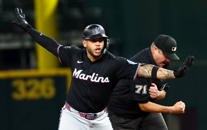Deadspin | 12th-inning uprising sparks Marlins, damages Rangers' playoff hopes